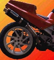 Teeny, tiny photo of a MIG on a bike with a Thurn single-sear conversion.